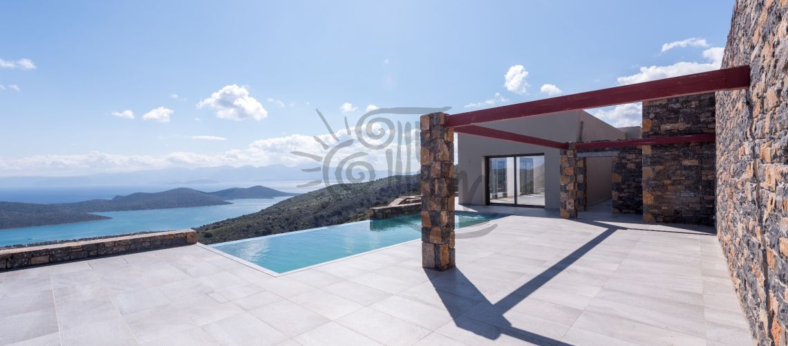 Lassithi Elounda. Luxury villa for sale 270 sqm on a plot of 6100 sqm with a unique sea view . property first image
